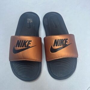Gold Nike slides sandals sz 9 womens